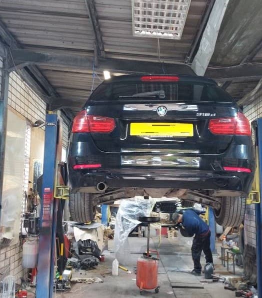 Mechanic working on a car