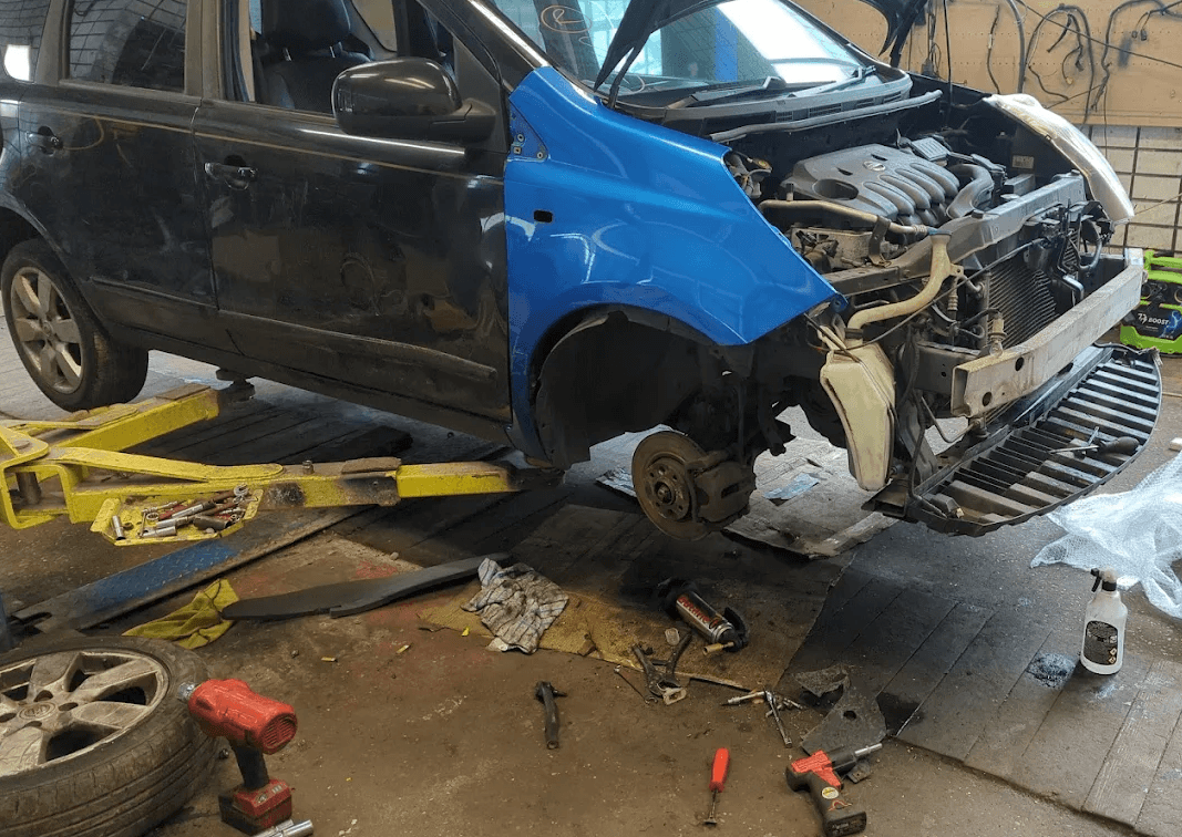 Mechanic working on a car