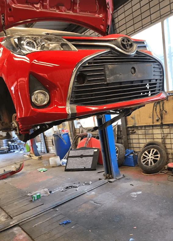 Mechanic working on a car