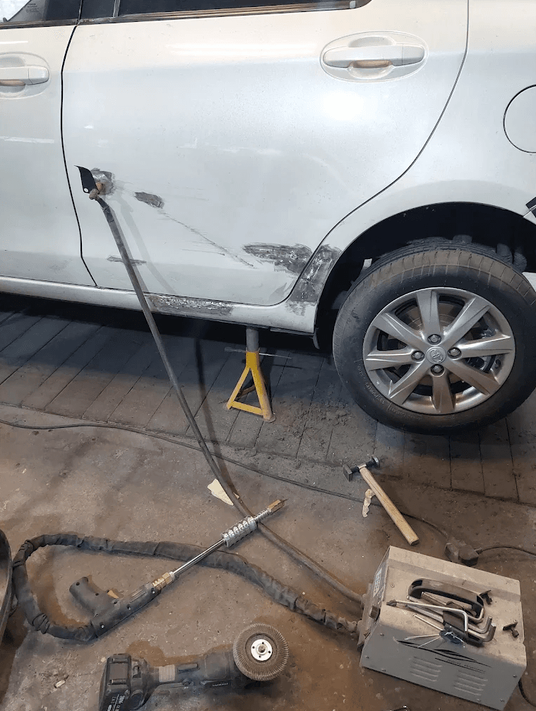 Mechanic working on a car